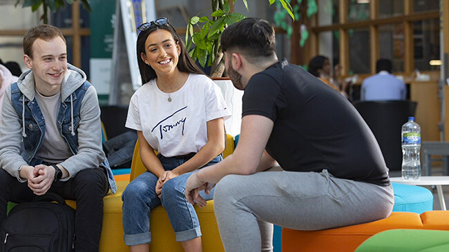 Undergraduate students in NCI's atrium